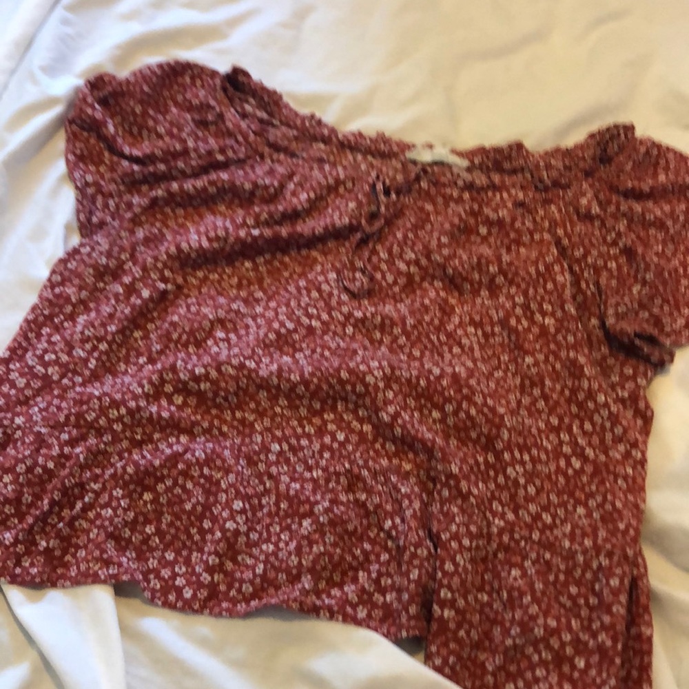 Red and white floral blouse with tie on front